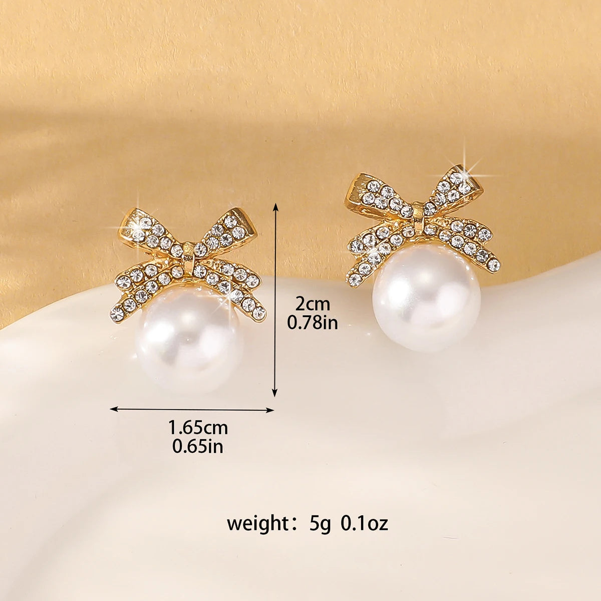 Silver Needle Bow Studded With Diamond Pearl Earrings